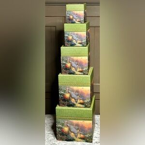 Thomas Kincaid stacking boxes